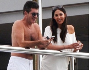 Simon Cowell, left, with his "baby mama" Lauren Silverman, right.