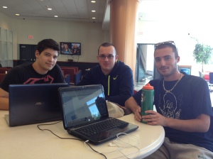 Students Tom Perry, Michael Schriefer and Greg Jositas meet in the student center, but Jositas said the new hours did not influence his decision to stay on campus. 