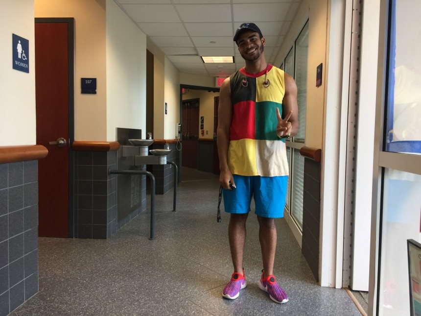 Sammy Maximin,  senior business finance major, outfitted in his favorite style: bright clothing which matches his mood. 